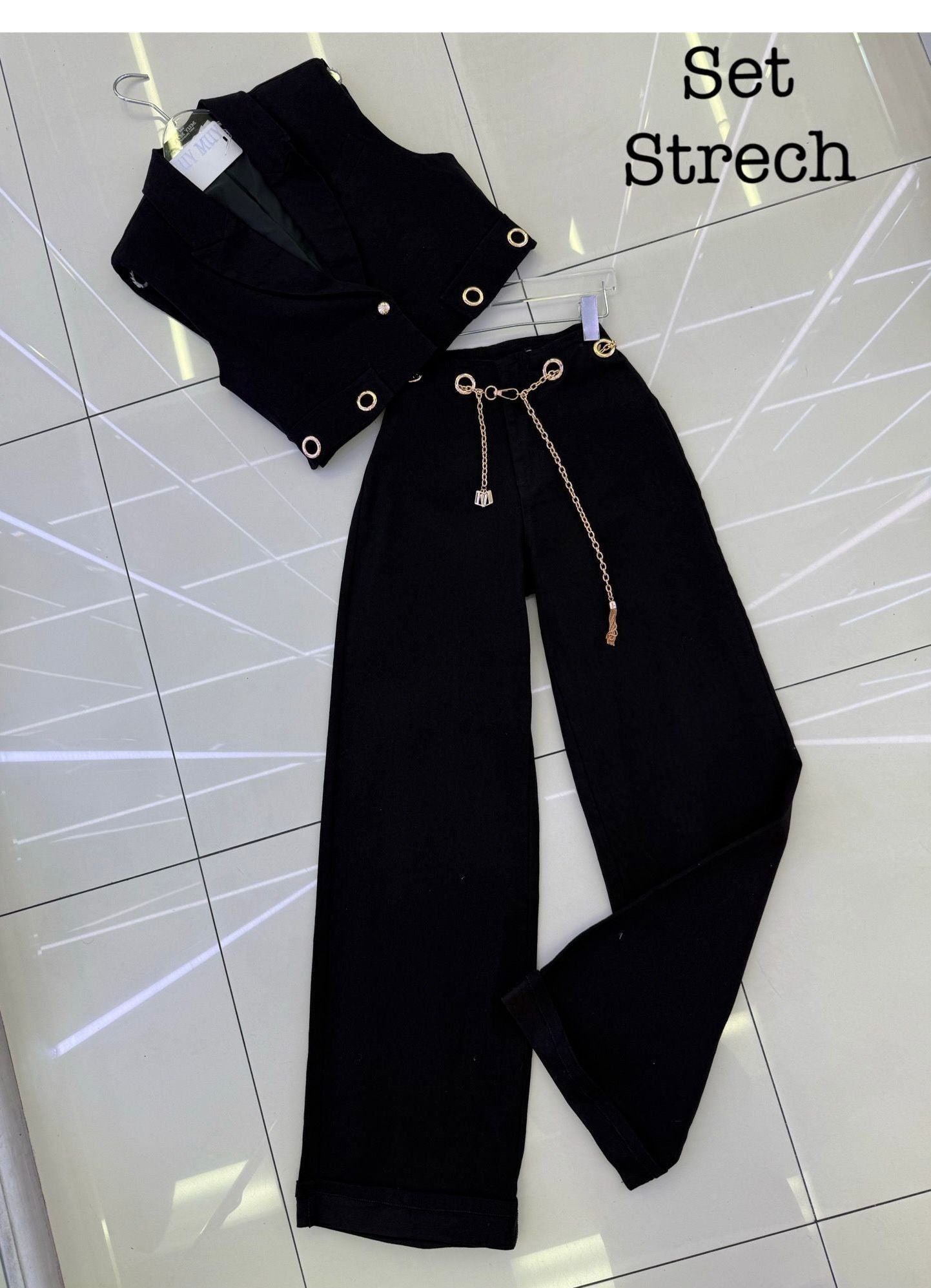 Conjunto de chaleco y pantalón vaquero